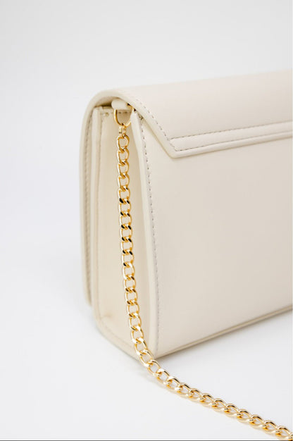 Love Moschino beige shoulder bag in faux leather with gold chain, clip closure, and bold logo detail. 